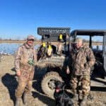 Happy hunters and a proud duck dog!