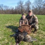 Happy father and son youth turkey hunting!