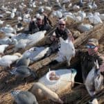 Group of friends enjoying a day in the snow goose blind.