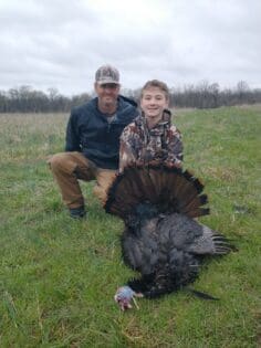 Bodey with his big tom he harvested in 2025 Illinois youth season.