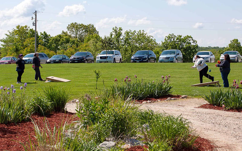 Women playing Cornhole