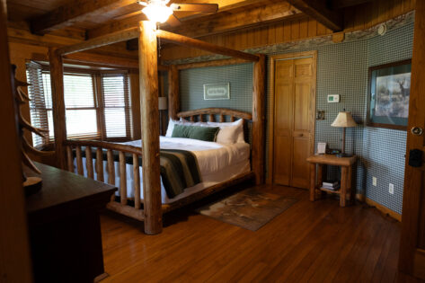 King Bed with two person jetted tub in room