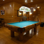 Pool table and card table at the Prairie Ridge Lodge