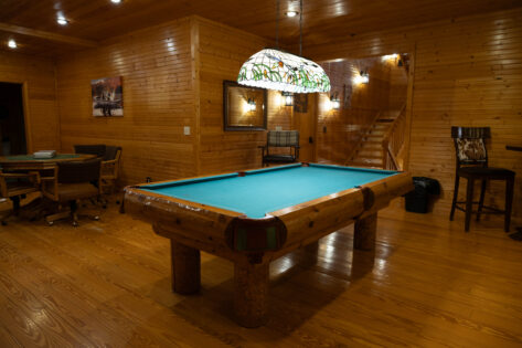 Pool table and card table at the Prairie Ridge Lodge