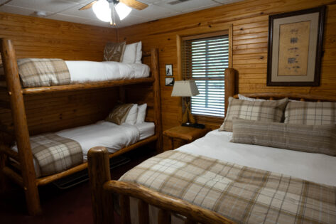 Queen bed with bunk bedroom.
